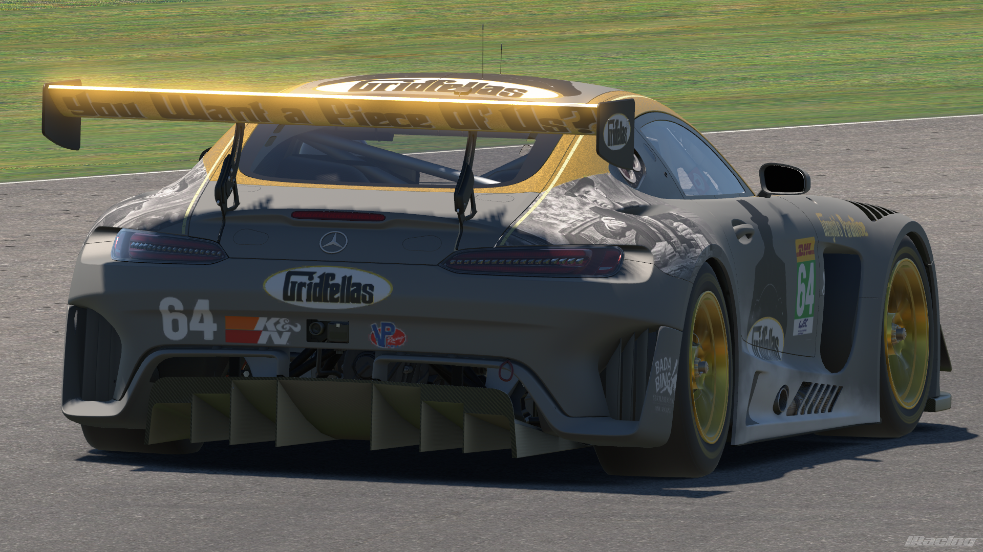 Rear view of a gold and black Gridfellas Mercedes-AMG GT3